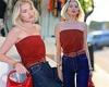 Elsa Hosk keeps it simple in red strapless top and dark denim jeans at FWRD ... trends now