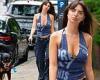 Emily Ratajkowski shows off her toned frame in a plunging halter top as she ... trends now