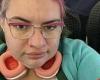 Qantas passenger Nikita Bennett crawled to her seat after being dropped from ... trends now