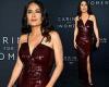 Salma Hayek oozes glamour in a plunging sequinned burgundy gown as she attends ... trends now