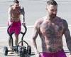 EXCLUSIVE: Adam Levine flashes his tattoos as he goes shirt-free in pink shorts ... trends now
