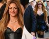 Shakira sizzles in a black leather mini dress and thigh-high boots for a ... trends now