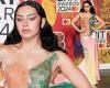 BRIT Awards 2024: Charli XCX commands attention in trailing multi-coloured ... trends now