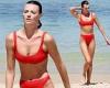 Red hot! Montana Cox shows off her model physique in a vibrant crimson bikini ... trends now