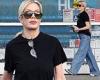 Tori Spelling cuts a casual figure in baggy jeans and oversized t-shirt while ... trends now