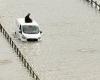 Emergency crews rescue van driver stuck in deluge as nearly 300 flood warnings ... trends now