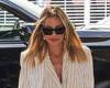 Nicole Richie cuts a chic figure in a white pinstripe suit as she heads to The ... trends now