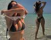 Kim Kardashian shows off her sizzling curves in a tiny black bikini while ... trends now