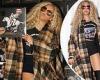 Beyonce poses in a cowgirl chic look while celebrating the success of her new ... trends now