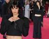 Sofia Boutella shows off her toned midriff in a cropped black satin blazer and ... trends now