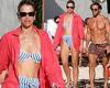 Vogue Williams shows off her St Barts tan in a striped bikini as she enjoys ... trends now