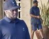 Diddy takes a call at his Miami mansion - after double raids on his homes amid ... trends now