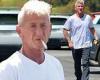 Sean Penn displays his platinum white hair as he takes a smoke break during ... trends now