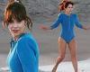 Zooey Deschanel rocks a quirky blue swimsuit as she frolics on the beach in ... trends now