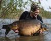 That fish is nothing to carp about! Female angler lands fish weighing more than ... trends now
