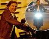 Arc De Triumph! Tom Cruise flashes a broad smile as he rides a motorbike in ... trends now
