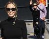 Emily Blunt keeps it chic in black Louis Vuitton turtleneck as she waves at ... trends now