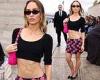 Lily-Rose Depp flaunts her washboard abs in a black crop top and pink mini ... trends now