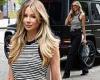 Olivia Attwood cuts a stylish figure in a striped vest and jeans as she runs ... trends now