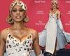 Laverne Cox dons fascinator and cleavage-boosting dress for The King's Trust ... trends now