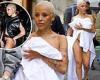 Doja Cat's just rolled out of bed! Rapper shocks by wearing just linen SHEET ... trends now