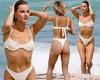 Joy Corrigan sets pulses racing in a skimpy white bikini as she frolics in the ... trends now
