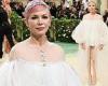 Michelle Williams puts on a leggy display in thigh-skimming Chanel dress as she ... trends now