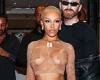 Doja Cat goes braless in a completely see-through nude crop top and tights (her ... trends now