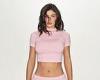 Kylie Jenner flashes her toned tummy as she introduces her new colorful Khy ... trends now