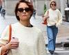 Katie Holmes is on-trend in baggy blue jeans and sweater as she braves rain ... trends now