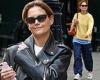 Katie Holmes shows style range in black leather jacket and plain yellow sweater ... trends now