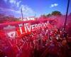 sport news Liverpool fans greet the team bus with smoke flares as thousands line the ... trends now