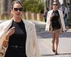 Alessandra Ambrosio puts on a VERY leggy display in a black top and short ... trends now