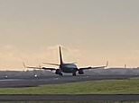 Dramatic moment plane suddenly slams on the brakes while speeding down Manchester Airport runway